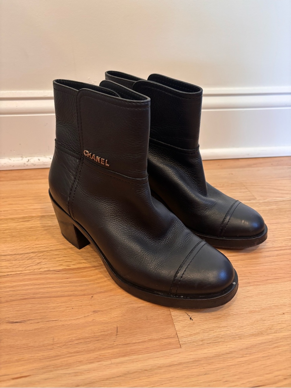 Chanel black leather ankle boots size 38